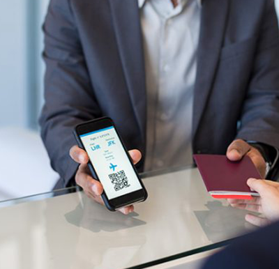 Unused Ticket Management - businessman presenting QR code at check-in